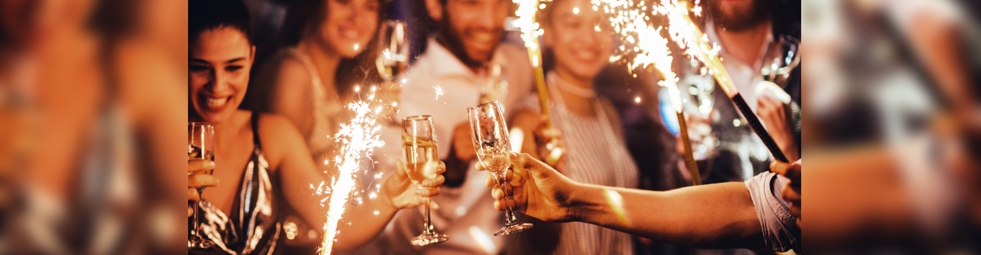 Group of friends toasting in the club